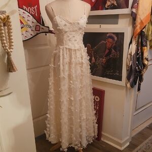 Elegant Ivory Maxi Dress with Textured Appliqué